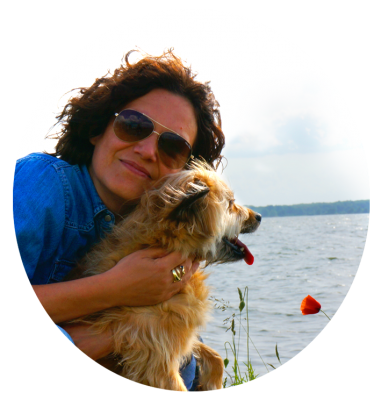 Jacqueline Abromeit freelance book cover designer with her dog Bunny